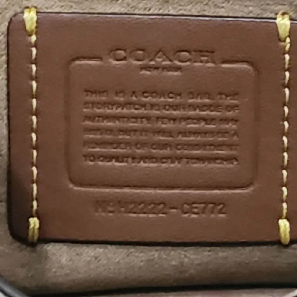 Coach Tabby Mini Chain Clutch in Chalk pebbled leather with gold-tone upgraded c